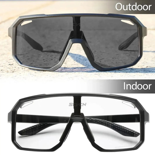 Sunglasses with different lenses labeled 'Outdoor' and 'Indoor' on a textured surface.