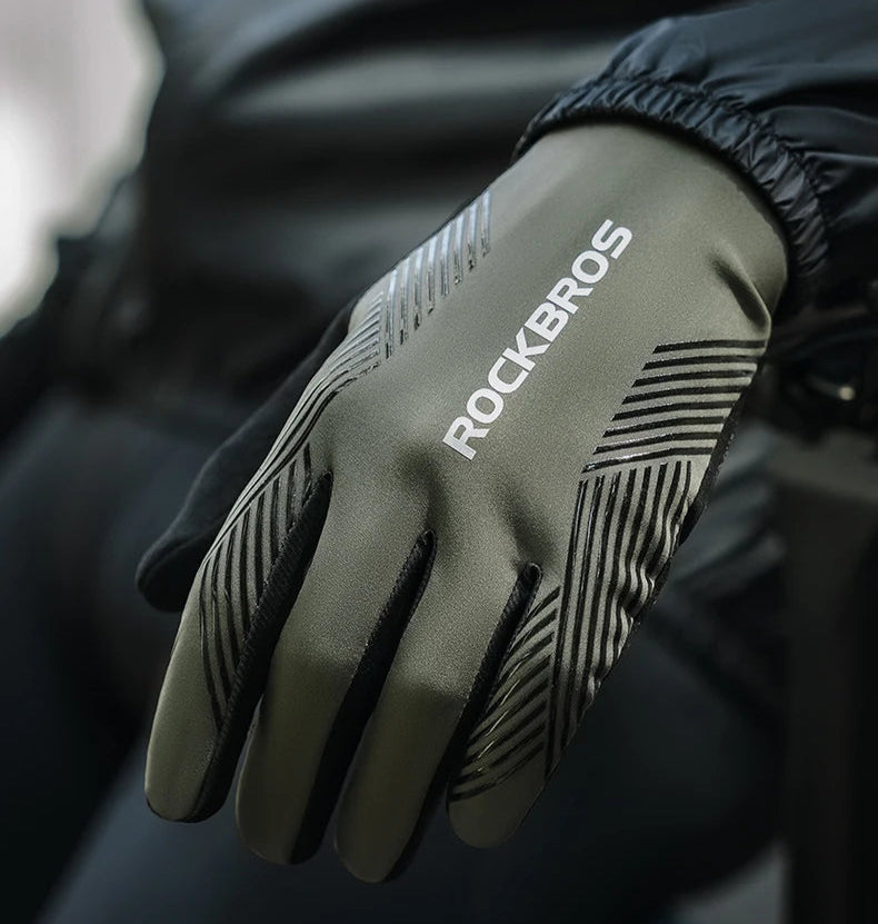 Black glove with 'RockBros' branding on a blurred background