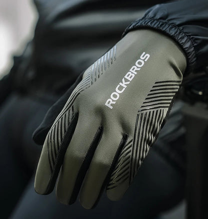 Black glove with 'RockBros' branding on a blurred background